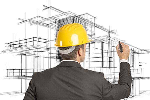 Photographie d'un professionnel architecte travaillant un projet symbolisant le Diplôme d'Université Business Management Parcours Architecte en formation continue - Dauphine Executive Education de l'Université Paris Dauphine-PSL